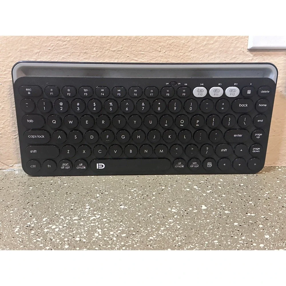 Multi-Device Bluetooth Wireless Keyboard with Integrated Tablet Stand - Picture 3 of 8